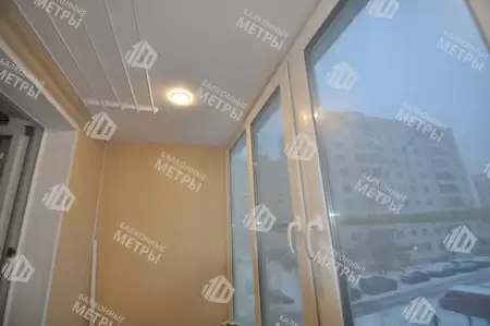 Остекление и отделка балкона ПВХ панелями и ламинатом